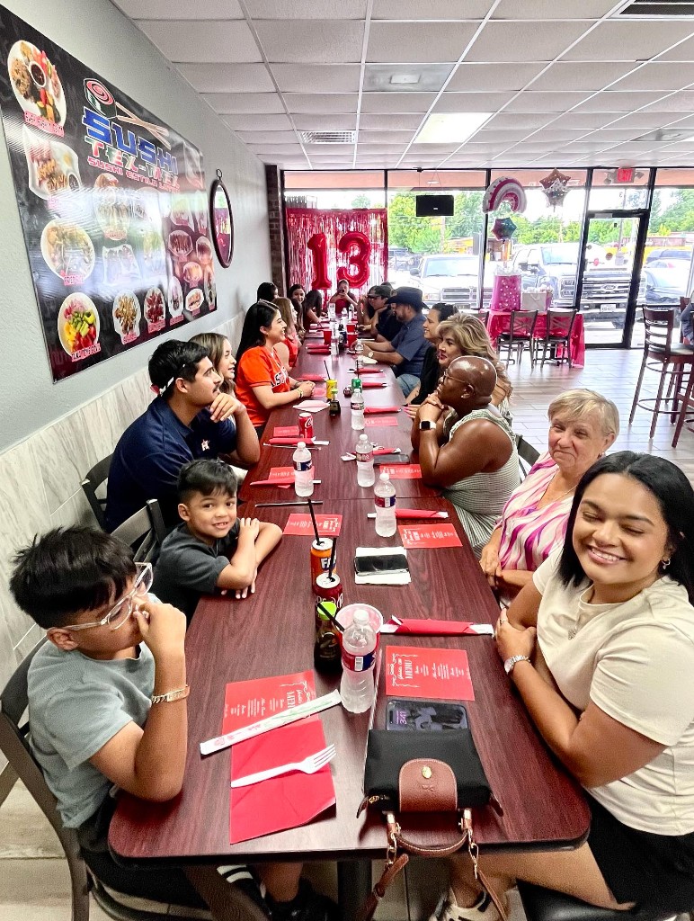 Guests celebrating a birthday party at Sushi Tex Mex